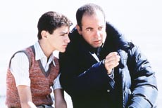 Giuseppe Sulfaro nei panni di Renato Amoroso uno dei protagonisti del Film Malena con Monica Bellucci e la Regia di Giuseppe Tornatore. Nella foto medesima, ripresa dal backstage del cast, il grande Tornatore da alcuni consigli a Sulfaro sulla seguente scena da girare...